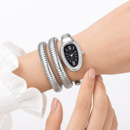 Luxury Women's Silver Snake Coil Bracelet Watch – Crystal Bezel Black Dial